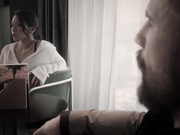 更深的。阿德里安娜戴着手铐，不得不看着